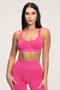 Fake BBL sports bra hot pink